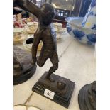 A bronze footballer,