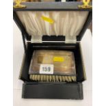 A hallmarked Silver boxed brush set