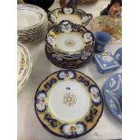 A Victorian gilt/ porcelain plates and serving plates