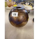 A glass vase, marbled effect,