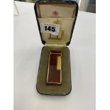 A boxed Dunhill lighter, inc.