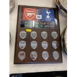 An Arsenal and Spurs Golf trophy,