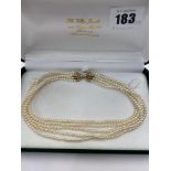 A five row cultured Pearl necklace on 18ct Diamond set clasp,