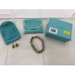 A Tiffany set of silver ball earrings and matching bracelet,