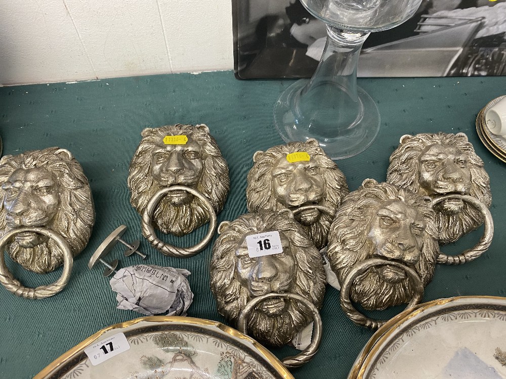 Silvered Lion door knockers,