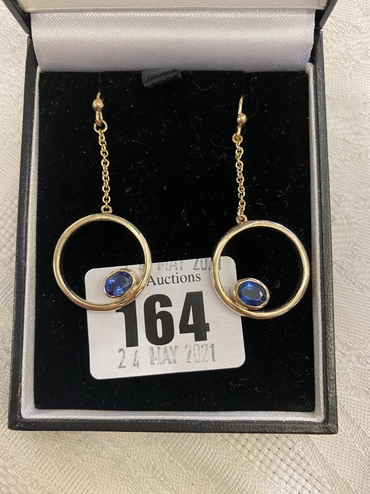 A pair of yellow metal and Sapphire set earrings