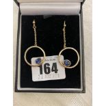 A pair of yellow metal and Sapphire set earrings