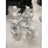 A collection of china cherubs