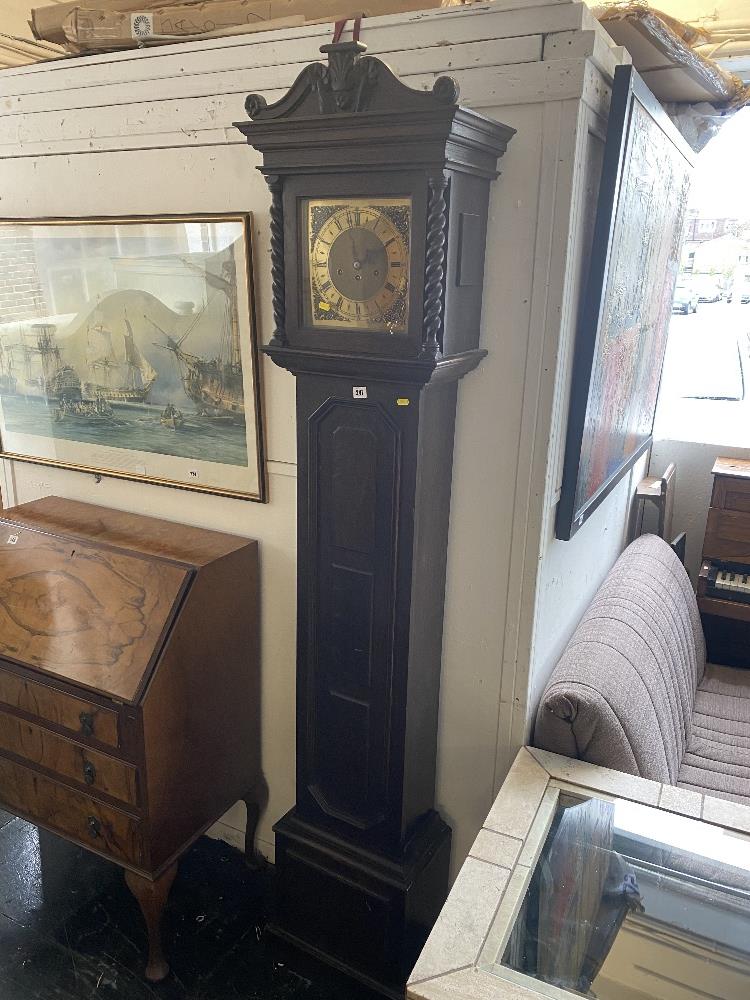 An Oak barley twist Grandfather clock