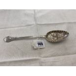 A hallmarked Silver berry spoon,