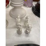 Four porcelain Angels,