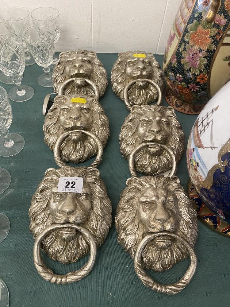 Silvered Lion door knockers,