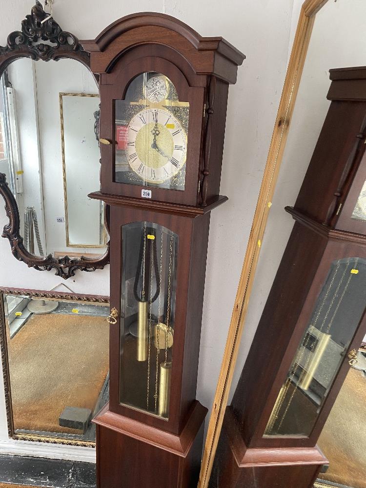 A Mahogany musical long case clock