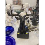A Bronze Stag's head on a marble plinth,