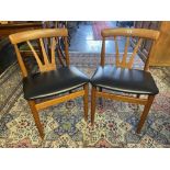 Two mid century Teak dining chairs, one slight a.
