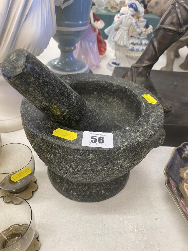 A large pestle and mortar