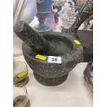 A large pestle and mortar