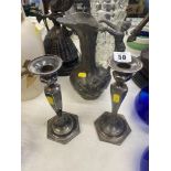 A Pewter decorative jug and candlesticks