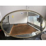 A brass Oval mirror