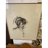 A framed and glazed charcoal drawing of a lady