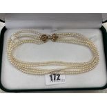 A five row cultured Pearl necklace on 18ct Diamond set clasp,