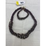 A Garnet multi strand necklace and matching bracelet