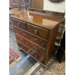 A Walnut chest of five drawers