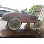 A tin plate child's racing car