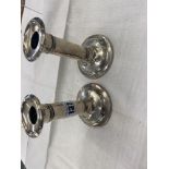 A pair of hallmarked Silver candlesticks