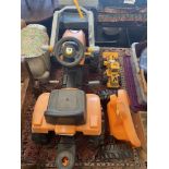 A child's bulldozer and a smaller toy