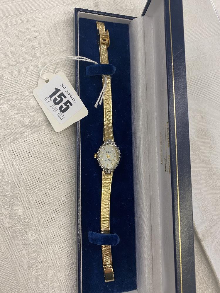 A Marcel Sticker ladies watch with ten small Diamonds