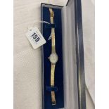 A Marcel Sticker ladies watch with ten small Diamonds