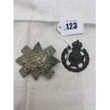 Two military badges