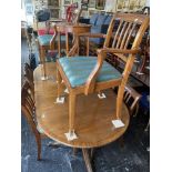 A regency style table and chairs