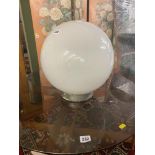 A large vintage glass lamp shade