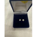 Pair 9ct white gold diamond earrings, approx. .