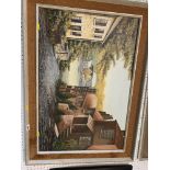 A framed oil on canvas street/ landscape
