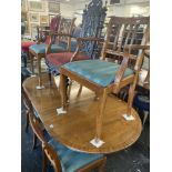 A regency style table and chairs