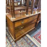 A Walnut chest of four drawers