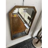 A gilt framed mirror