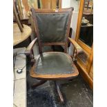 An Edwardian office swivel chair