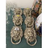 Silvered Lion door knockers,