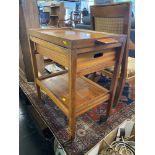 A Walnut two tier trolley