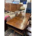 An Archie Shine mid century dining suite; sideboard, table (two leaves),