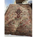 A Persian silk rug, approx.