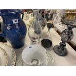 A hour glass, blue jug, black vase etc.