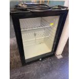A small black fridge,