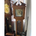 A Pine long case musical clock