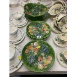 A salad bowl and serving plates,