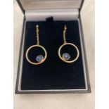 A pair of yellow metal and Sapphire set earrings